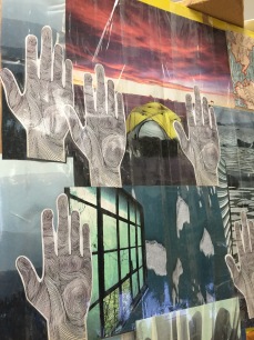 'hands up' collage on academic board at clarkston high school